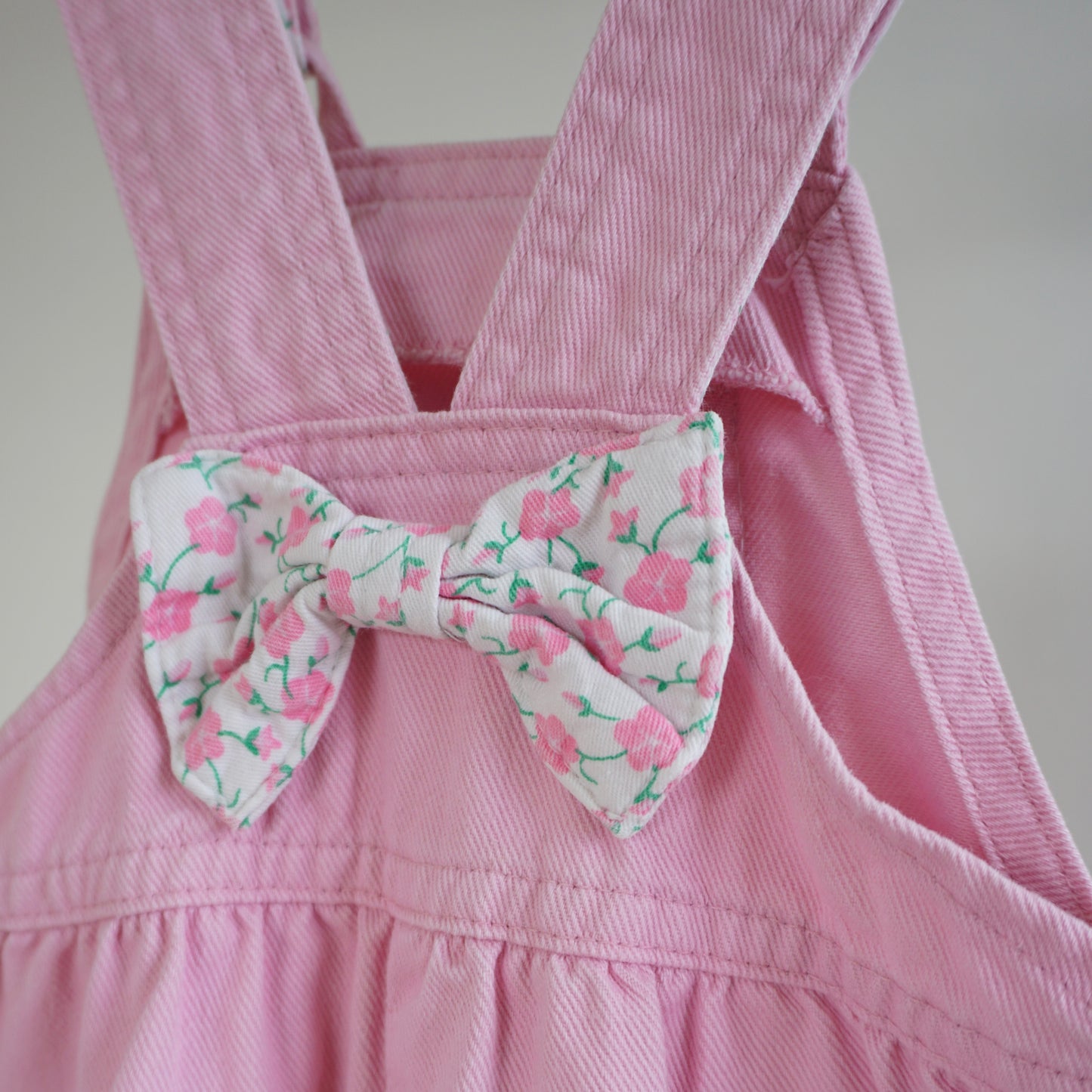 Vintage OshKosh Pastel Pink Bow-Back Cuffed Denim Overalls (3T)